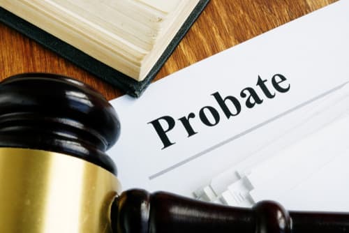 probate paperwork on desk under gavel