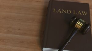 LAND LAW book and court gavel