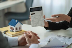 Discussion with subcontractor by showing an amount on calculator